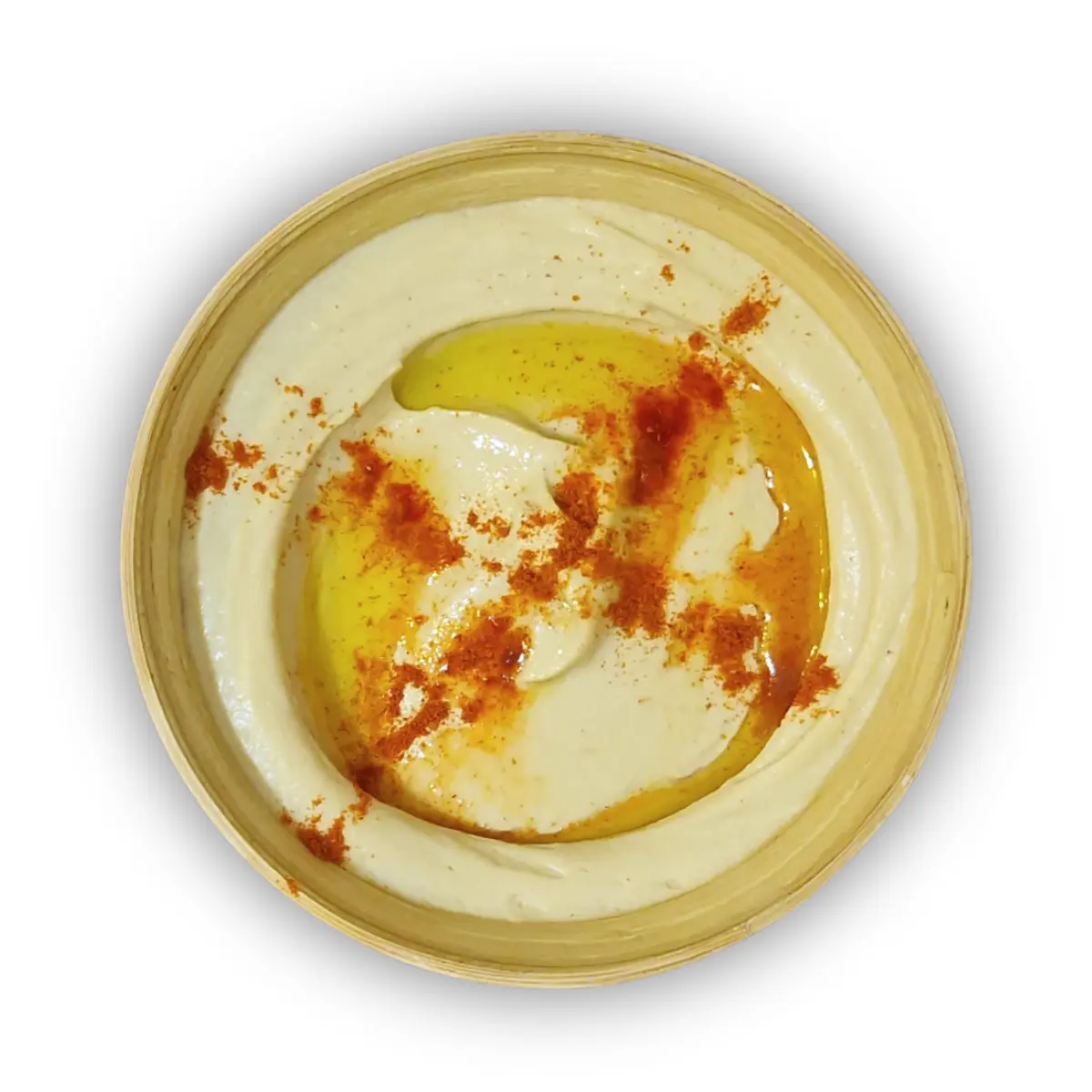 Cremiger Hummus Classic in der 500g Schale, garniert mit Olivenöl und Kichererbsen.
